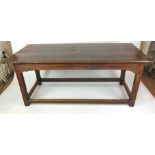 A late 18th century oak refectory table,