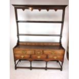 An 18th century and later oak Welsh dresser,