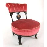 An Edwardian ebonised, parcel gilt and inlaid bedroom chair upholstered in a red cut fabric, h.