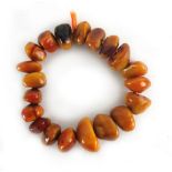 A necklace set with twenty amber pieces,