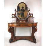 A Victorian burr walnut Duchess dressing table the oval mirror over central compartment and two