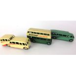 Three Dinky toy vehicles, a green and cream double decker bus with Dunlop advertising 29C,