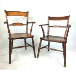 A near pair of 19th century elm seated open arm chairs on turned legs, h. 92 cm, w. 54 cm, d.