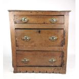 A late 17th century and later chest of three long drawers on shaped plinth, h. 84 cm, w. 79 cm, d.