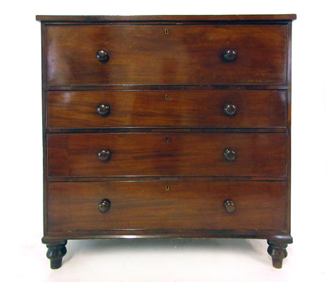 A 19th century mahogany chest of one deep over three graduated drawers on turned feet. h. 115 cm, w. - Image 2 of 2