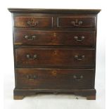 A mid 18th century oak chest of two short over three long drawers on bracket feet, h. 98 cm, w.