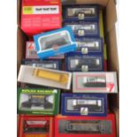 A collection of various boxed model railway wagons, tankers,