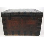 A 19th century pine and metal bound travelling trunk,