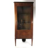 An Edwardian mahogany marquetry and boxwood strung corner display cabinet with green velvet lined