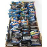 A collection of boxed Hot Wheels to include special WWE cars etc (qty)