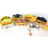 A selection of eight boxed replica Dinky Toys consisting of Morris Mini-Traveller 197,