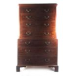 A George III mahogany chest on chest the top section having two short over three long drawers