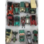 A collection of play worn die cast cars