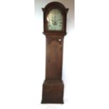 An 18th century oak and brass edged long case clock,