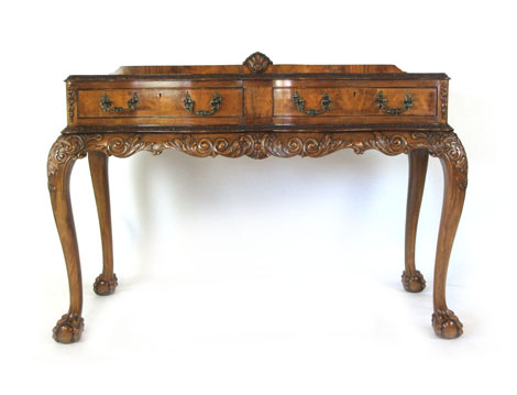 A reproduction 18th century style walnut buffet,