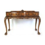 A reproduction 18th century style walnut buffet,