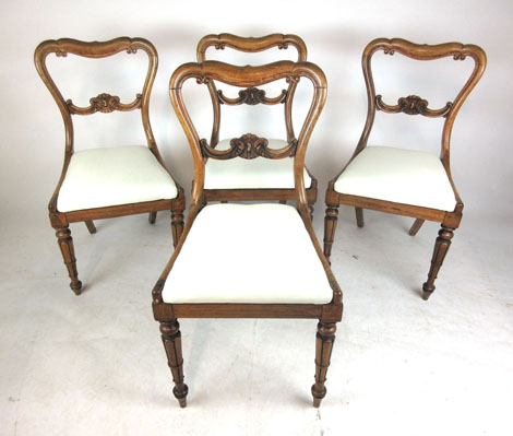 A set of four George IV rosewood dining chairs stamped 'James Winter, 101 Wardour St',