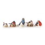 A group of five Royal Crown Derby paperweights modelled as birds, all with gold stoppers,