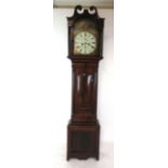 A 19th century mahogany long case clock the painted enamelled face with Roman numerals,