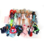 A group of seven Barbie and Sindy dolls,