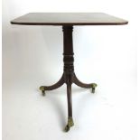 A 19th century mahogany tripod table, the rectangular top on turned column and three splay legs, h.