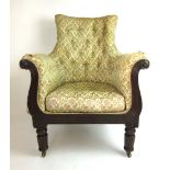 A Regency mahogany arm chair with button back upholstery on turned and reeded legs, h. 102 cm, w.