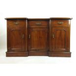 A Victorian and later mahogany reverse breakfront side cabinet with three drawers over three