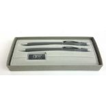 A cased set of two Cross ball point pens bearing the Concorde name,