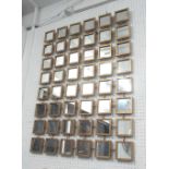 WALL MIRROR, Contemporary style multi-segmented gilt metal frame, 76cm W x 101cm H.