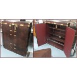CUPBOARD, leather luggage style, brass studwork and locks, interior shelves and filing drawer,