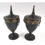 TOLEWARE LIDDED URNS, a pair, Regency manner, each 30cm H overall (with faults).