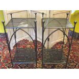 STANDS, a pair, wrought iron, each square with finials and undertier, 36cm x 36cm x 72cm H.