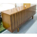 SIDEBOARD, 1970's teak and rosewood with four doors and slender supports, 77cm H x 214cm W x 43cm D.