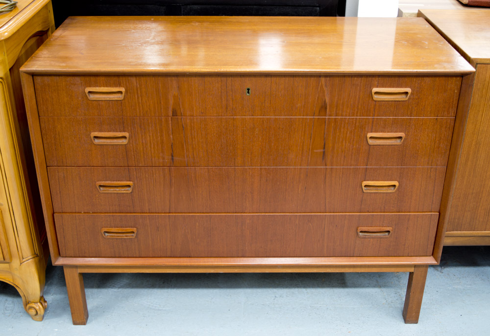 CHEST, circa 1970, Danish teak of four long drawers, 75cm H x 100cm W x 45cm D.