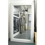 MIRROR, of substantial proportions, with a white leather covered framed, 201cm x 221cm.