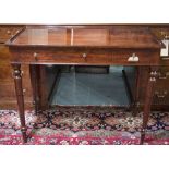 WRITING TABLE, Regency mahogany with three frieze drawers and turned supports,