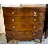 BOWFRONT CHEST, early 19th century English flame mahogany with two short above three long drawers,