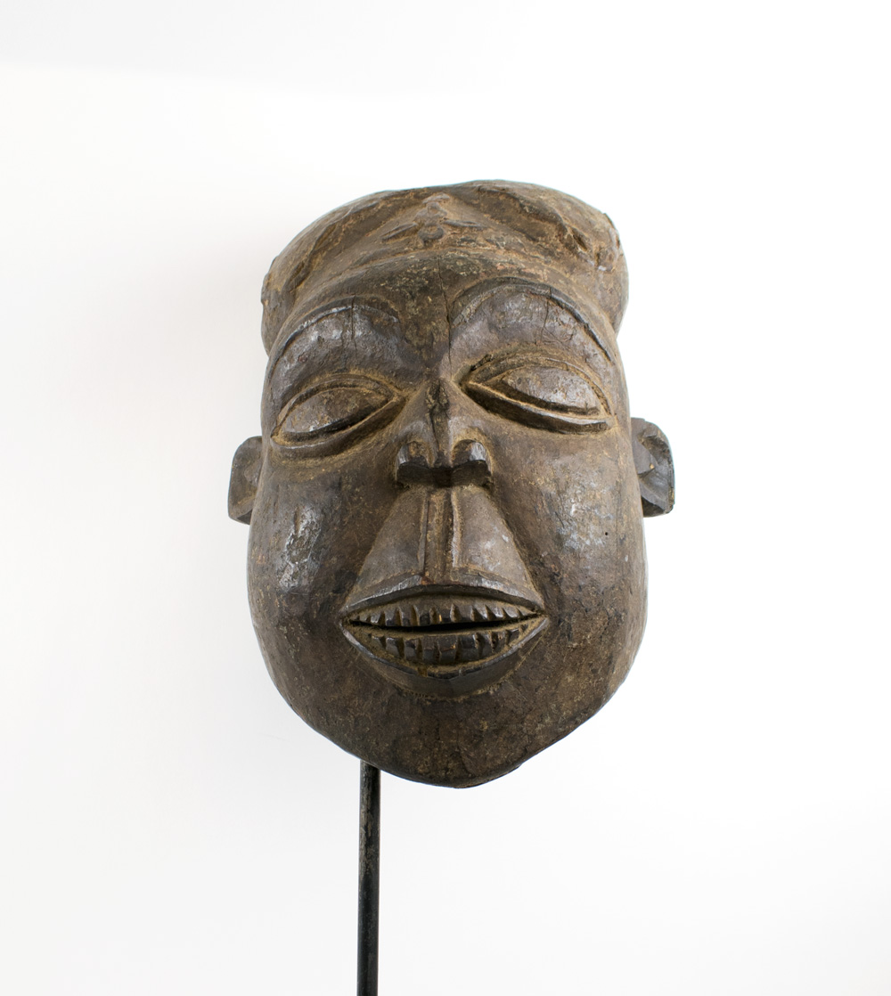 LARGE BAMOUN HEAD MASK, carved wood, 40cm x 26cm, presented on modern display stand.