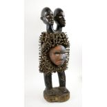 TWIN HEADED FETISH FIGURE, D. R. Congo, carved wood with nails and sisal detail, 71cm H overall.