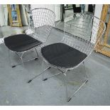 DINING CHAIRS, a set of eight, Bertoia style with black cushions, 52cm W.