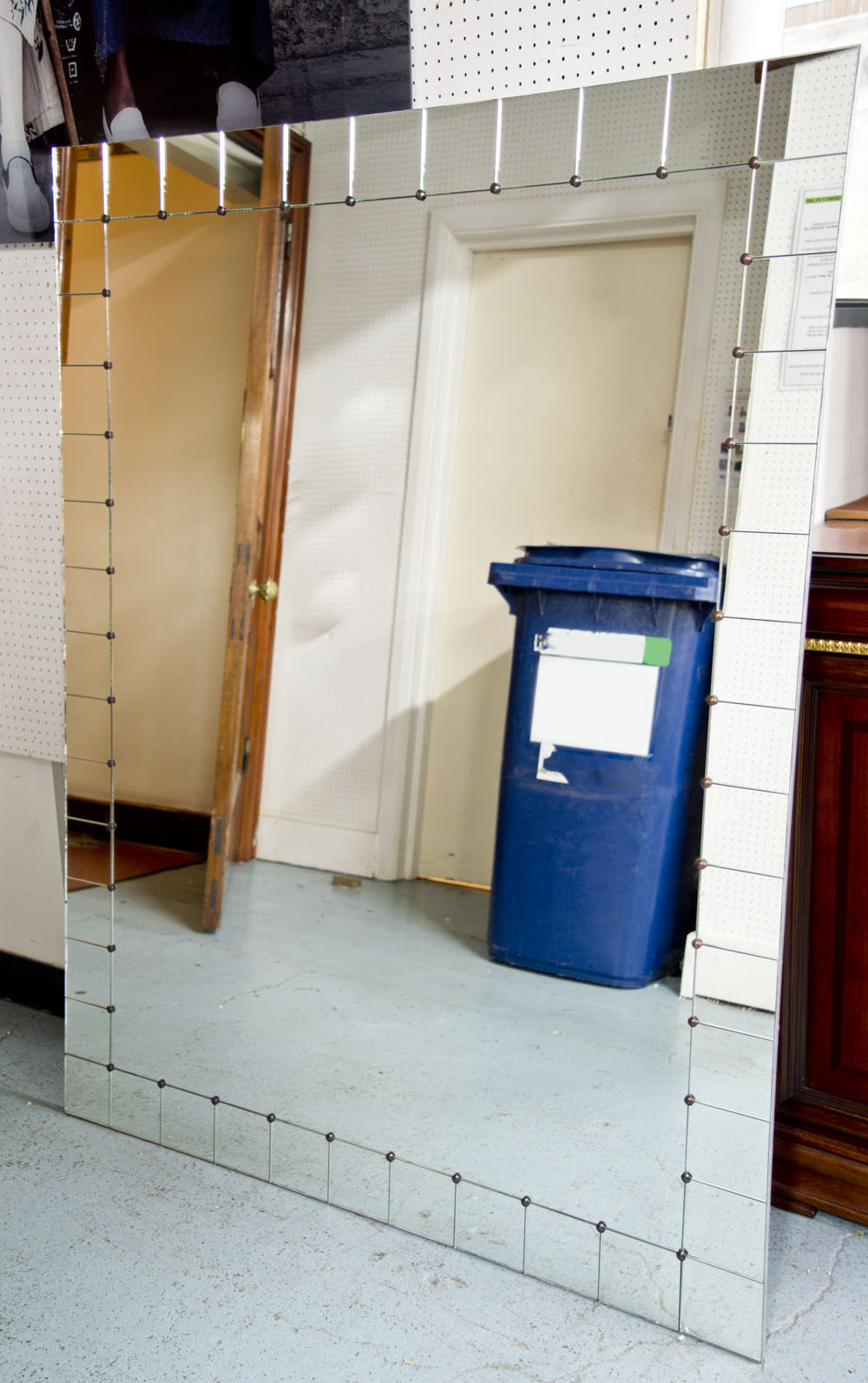 WALL MIRROR, rectangular with studded marginal square plates, 116cm W x 150cm H.