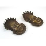 BRONZE BAMOUN MASK PENDANTS, two similar, Cameroon, each 24cm H x 14cm W max.