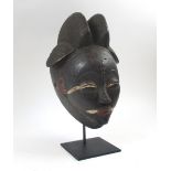 PUNE FACEMASK, carved wood with whitened highlights, 37cm H x 21cm W,