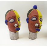 IFE BEADED HEADS, a companion pair, with all over colourful beadwork decoration, 43cm H and 39cm H.