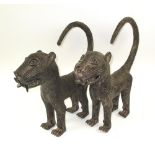 BENIN BRONZE LEOPARDS, a pair, each 41cm L x 42cm H max.