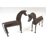 LOBI BRONZE HORSE SCULPTURES, a pair, decorated raised concentric demi-lune roundels, each approx.