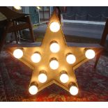 STAR, light up wall art, eleven light bulbs held in a steel frame, 50cm W x 48cm H.