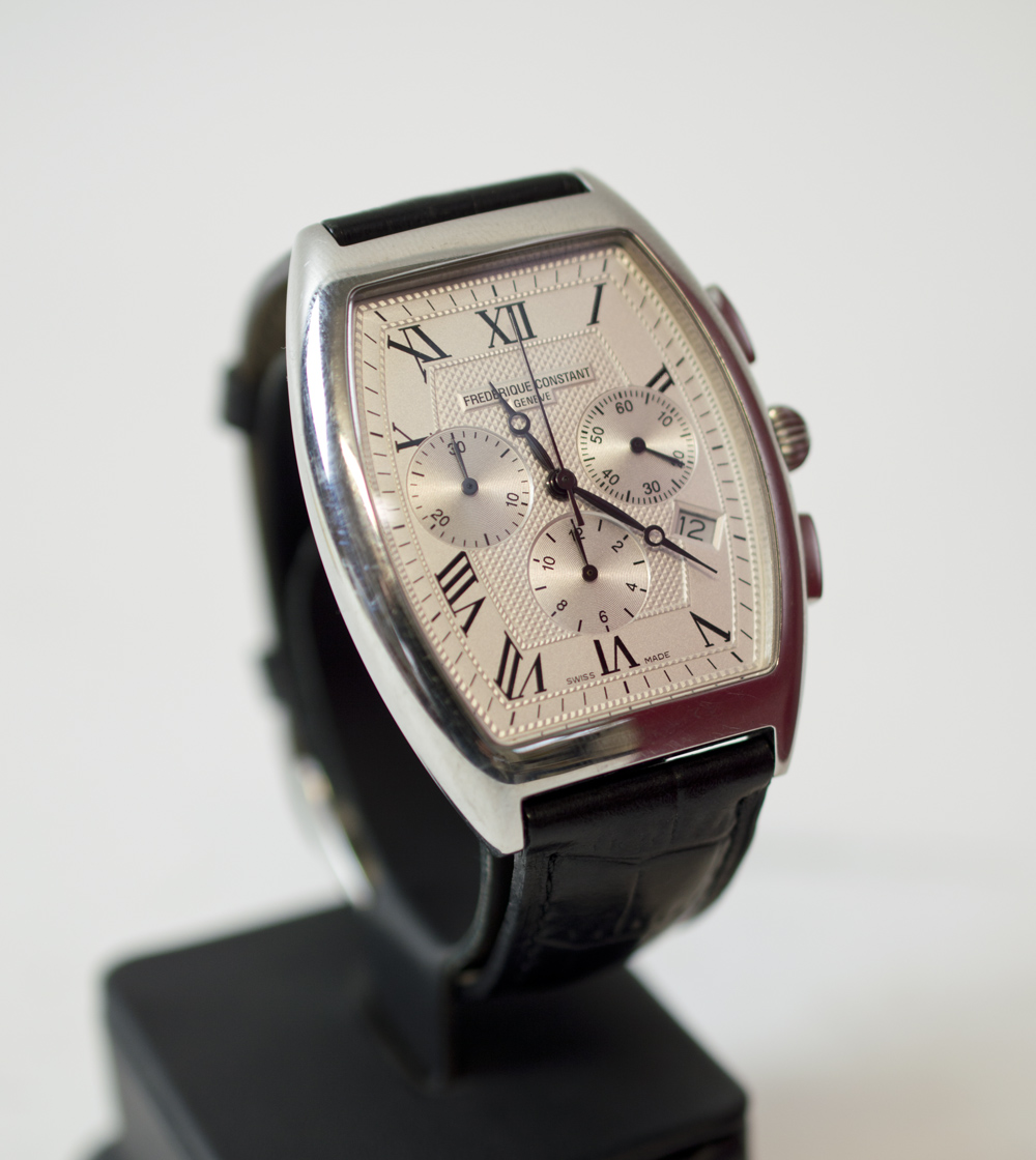 TONNEAU SHAPED STAINLESS STEEL CHRONOGRAPH, on leather strap by Frederique Constant.