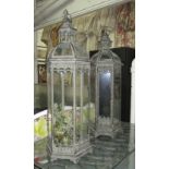 STORM LANTERNS, a pair, grey metal framed with glass and domed tops in a vintage style,