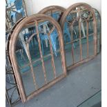 GARDEN MIRRORS, a set of three, in a distressed brown metal finish, 69cm x 88cm.